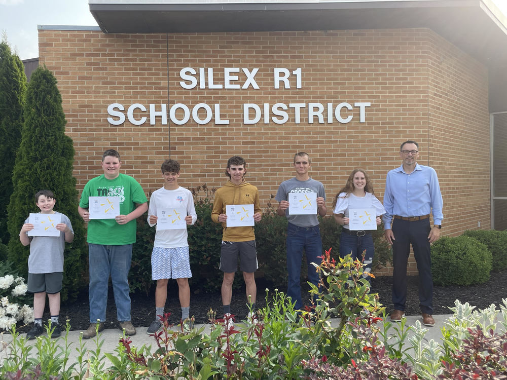 Congratulations to our May Students of the Month! Pictured L to R: Bryan Casey, 6th grade; Hunter Hall, 7th grade; Rylan Hallemeyer, 8th grade; Chase Mullen, 9th grade; J.W. Noxon, 10th grade; Hayley Gruenewald, 11th grade; Mr. Chris Gray, Middle/High School Principal. Not pictured is Tori Mudd, 12th grade.